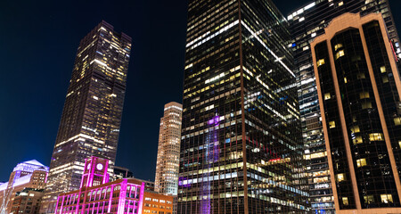 Chicago architecture of skyscraper. City night illuminated building. Skyscraper cityscape. Night city of Chicago. Business city. Night cityscape of Chicago skyscraper building. Glowing high rises