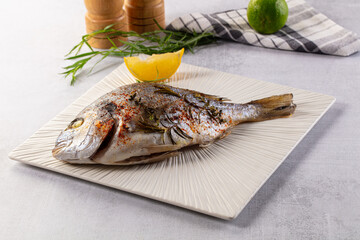Baked dorada fish with spices