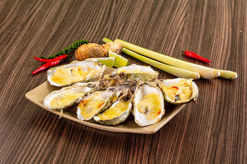 Gourmet baked oysters with cheese