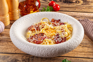 Italian classic spaghetti carbonara with bacon and egg
