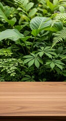 Tropical Lush Green Plants on Wooden Tabletop.