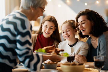 Family celebrating Thanksgiving Day