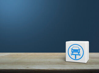 Service fix car with wrench tool flat icon on white block cube on wooden table over light blue wall, Business repair car service concept