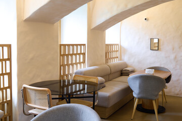 The interior of a modern cozy cafe features an elegant design that defines its charm and appeal