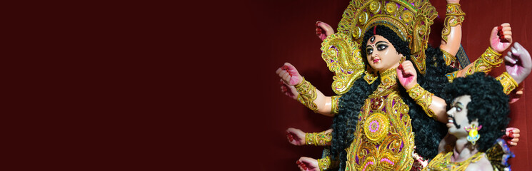 A beautiful image of Goddess Durga idol with clean copy space for adding text or greetings. Ideal for Durga Puja festival posters, invitations, wallpapers, and social media designs. 