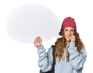 Redhead holding a comic speech bubble biting fingernails, nervous and very anxious.