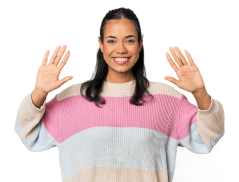 Young Filipina woman showing number ten with hands.