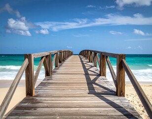 Fototapeta premium Wooden pier extending toward the ocean on a sandy beach
