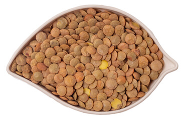 Isolated lentils in leaf-shaped container on a white background