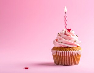 Pink birthday cupcake on pink background