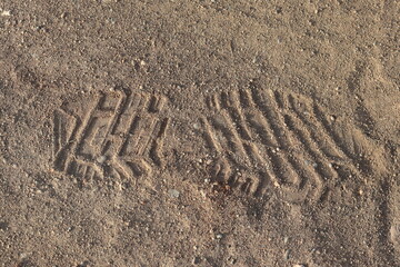 foot print (shoe print) on the sand