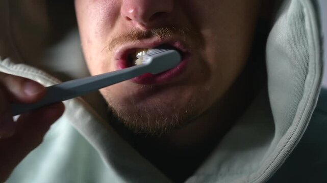 Oral hygiene.
A person brushes their teeth with a whitening toothbrush to keep their teeth white and healthy.
Dentist, oral hygiene, health