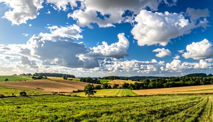 Panoramic view of a rural landscape under a partly cloudy sky