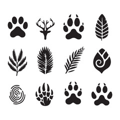Fototapeta premium Twelve black silhouette icons of animal paw prints deer antlers leaves and a fingerprint on a white background