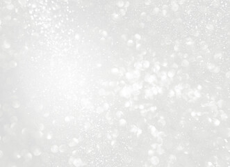 Abstract festive season concept background of silver light bokeh background, abstract blurred silver bokeh background