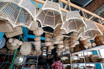 traditional market with goods made from rattan, bamboo and palm leaves.