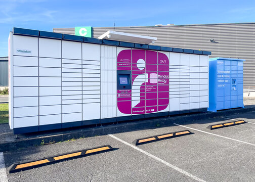 French Mondial Relay and Amazon lockers on a parking lot
