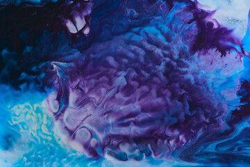 Abstract colorful background. Moving flow of blue purple paints, multicolored fluid liquid art