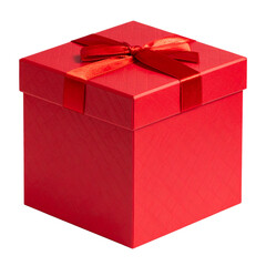 Red Christmas gift box with gold ribbon and bow wrapped in paper for a holiday celebration or birthday present surprise