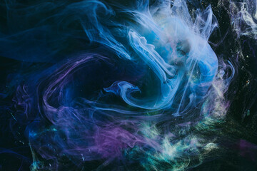 Abstract colorful background. Moving flow of blue purple paints, multicolored fluid liquid art