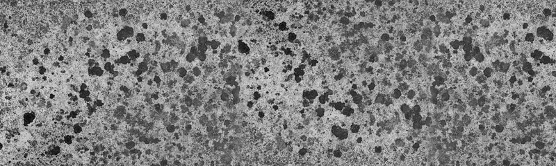 Abstract black and white textured pattern with vertical streaks. 