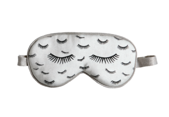 A patterned, white sleep mask featuring a design of closed eyelashes, with gray straps and trim