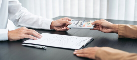 Bribe employer is offer terms to the businessman for signing on contract while making corruption about buy land and real estate