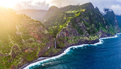 Scenic coastal cliffs and waterfall at sunset