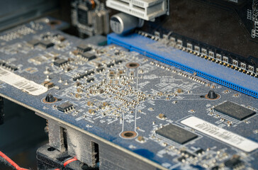 Dusty computer cooling fan and motherboard close up, dirty PC hardware component in need of cleaning and maintenance