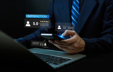 Businessman using smartphone and laptop with customer satisfaction, feedback, and star rating icons, symbolizing online review management, digital marketing, and brand reputation analytics.