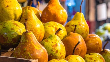 Ripe pears in a wooden crate