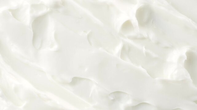 white skincare cream with smooth texture rotating