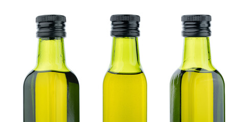 Olive oil in small green glass bottle isolated on white background. Olives. Oil. Healthy food.