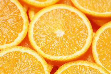 Marco shot an orange and turned it. Citrus. Close-up of citrus orange pulp. Orange slices. Fruit background.	
