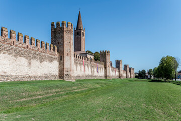 Fototapeta premium medieval city walls and green moat, Montagnana, Italy