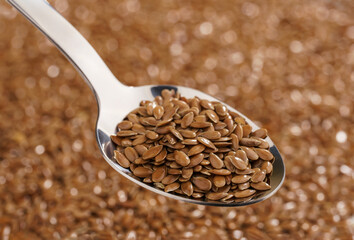 Macro photography of flax seeds. Grains. Flax seeds in a spoon. Healthy eating. 