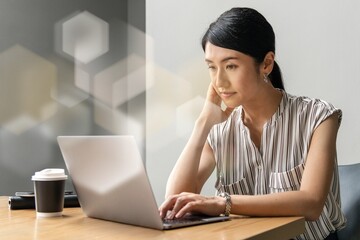Japanese woman working on a laptop
