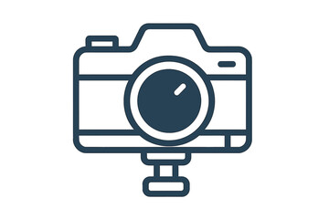 Digital camera mounted on a stand for photography and video recording