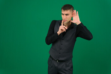 Professional collection of attractive European man in elegant business suit vest and black shirt green chroma key background expressing various emotions gestures and confident movements ideal for ad