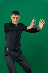 Professional collection of attractive European man in elegant business suit vest and black shirt green chroma key background expressing various emotions gestures and confident movements ideal for ad