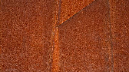 Fototapeta na wymiar Grunge industrial rusty orange brown geometric metal corten steel wall background texture banner