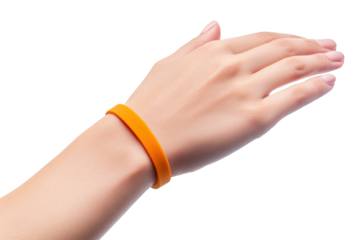 Orange wristband on a human arm isolated on transparent background. Silicon bracelet mock up on hand wrist isolated on white background.
