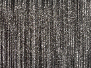 Close up of black silk linen fabric or linen wallpaper. Suitable for wall covering or upholstery textile. Seamless background texture.