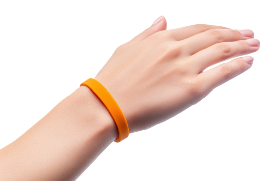 Orange wristband on a human arm isolated on transparent background. Silicon bracelet mock up on hand wrist isolated on white background.