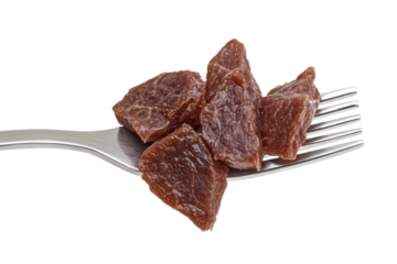 Pieces of dried meat on a fork isolated on transparent background. Slices of beef steak on a fork isolated on white background.