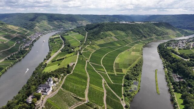 Marienburg, ormer church of medieval origin, partially rebuilt in 1957 with a valley and vineyard. Moselle river and river cruises in the Moselle valleys in summer time.