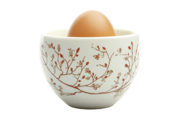 Decorative ceramic egg cup with a brown egg isolated on transparent background. White egg cup with egg isolated on white background.