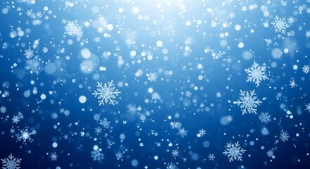 Abstract blue background with falling snowflakes and bokeh lights, representing winter and the holiday season