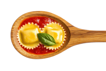 Ravioli with tomato sauce and basil on a wooden spoon isolated on transparent background. Wooden spoon with ravioli and tomato sauce isolated on white background.