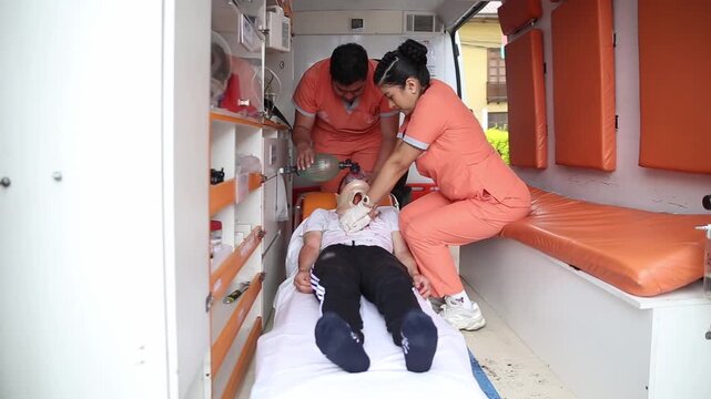 Paramedics urgently resuscitate a patient in an Ecuador ambulance